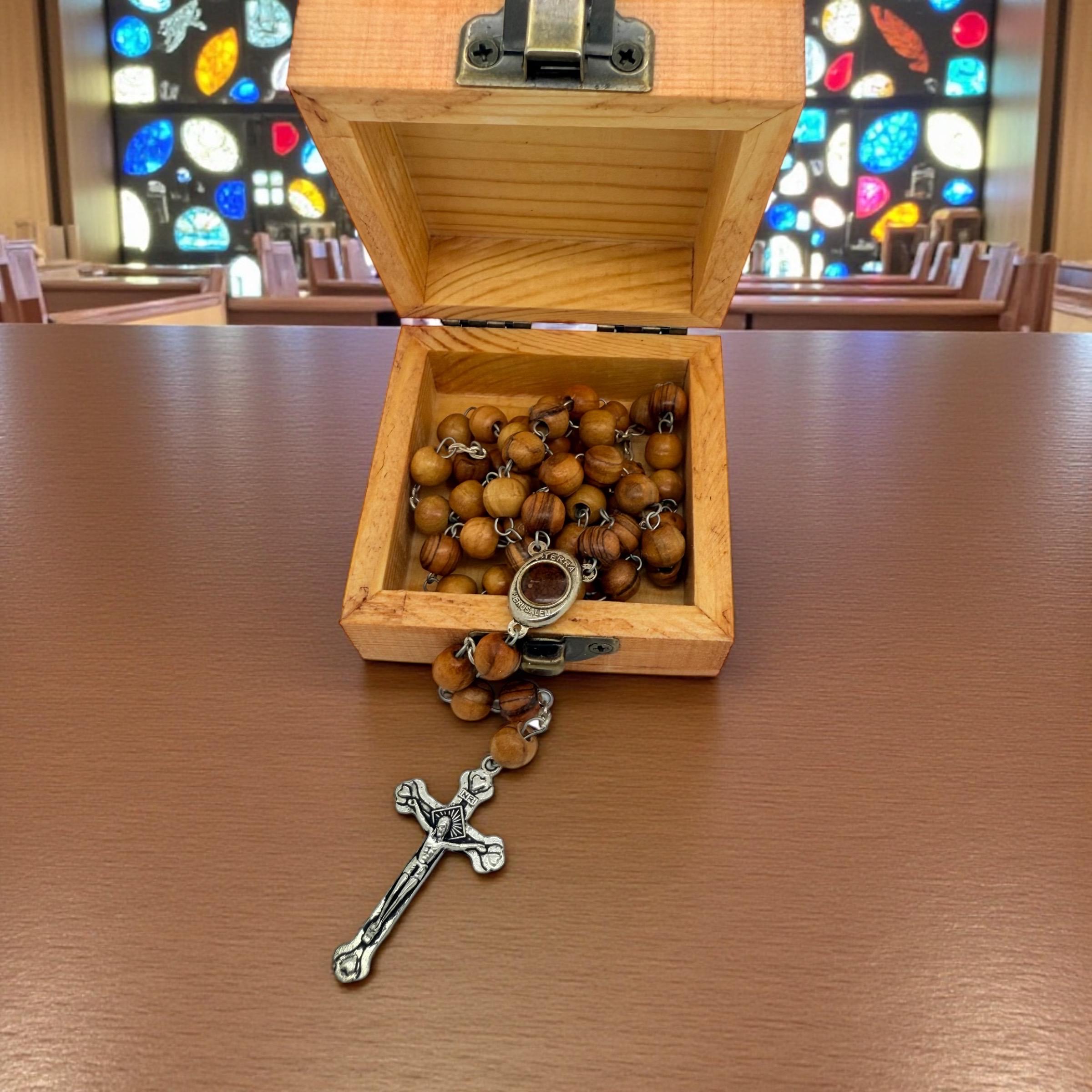 Bethlehem olive wood rosary beads with the Madonna and child holy soil centrepiece and wooden box handmade engraved with Bethlehem nativity
