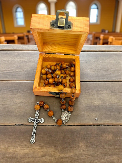 Bethlehem olive wood rosary beads with the Madonna and child holy soil centrepiece and wooden box handmade engraved with Bethlehem nativity