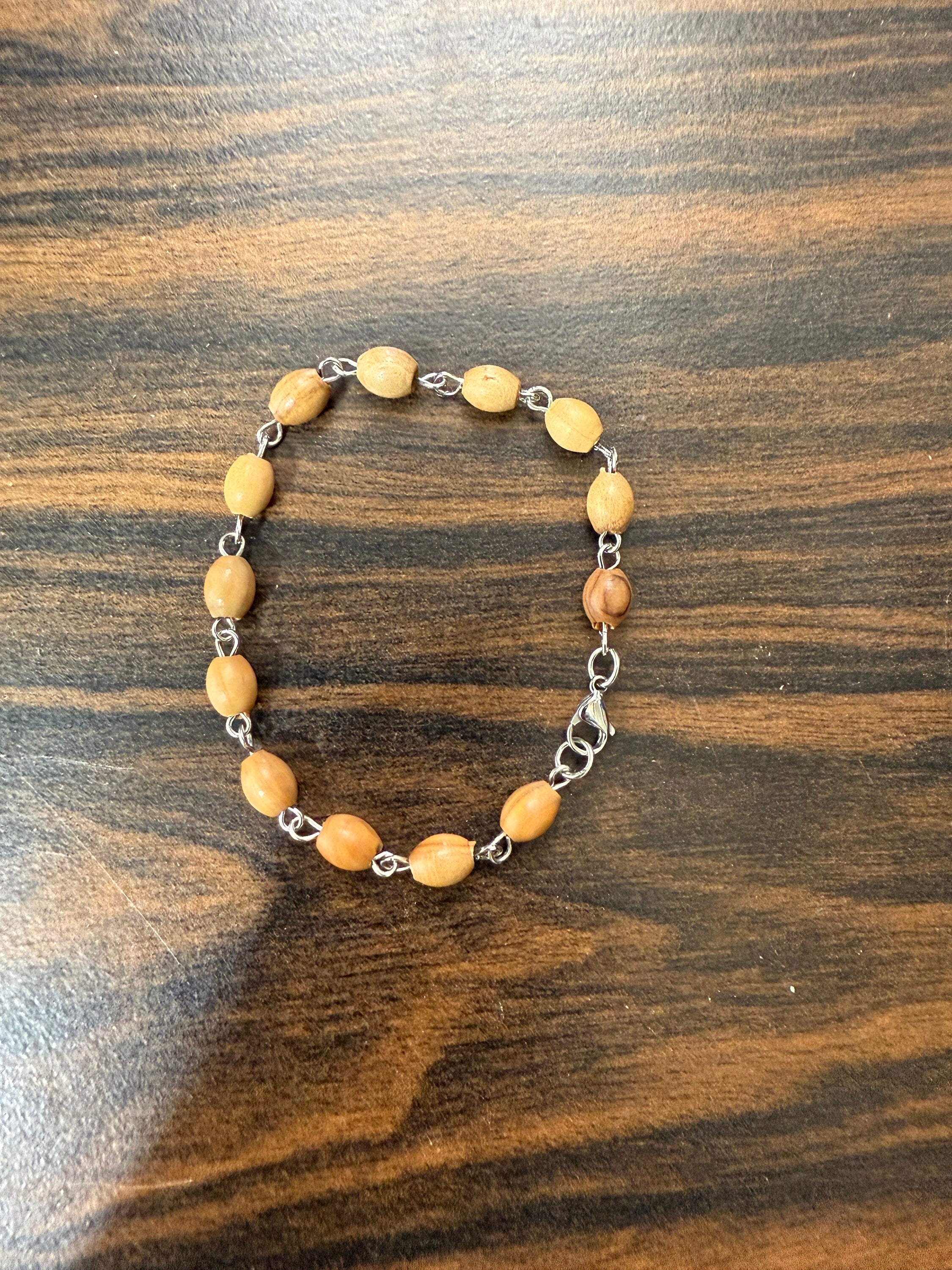 Handmade from Bethlehem olive wood beads bracelet available in size 6" to 7.5"