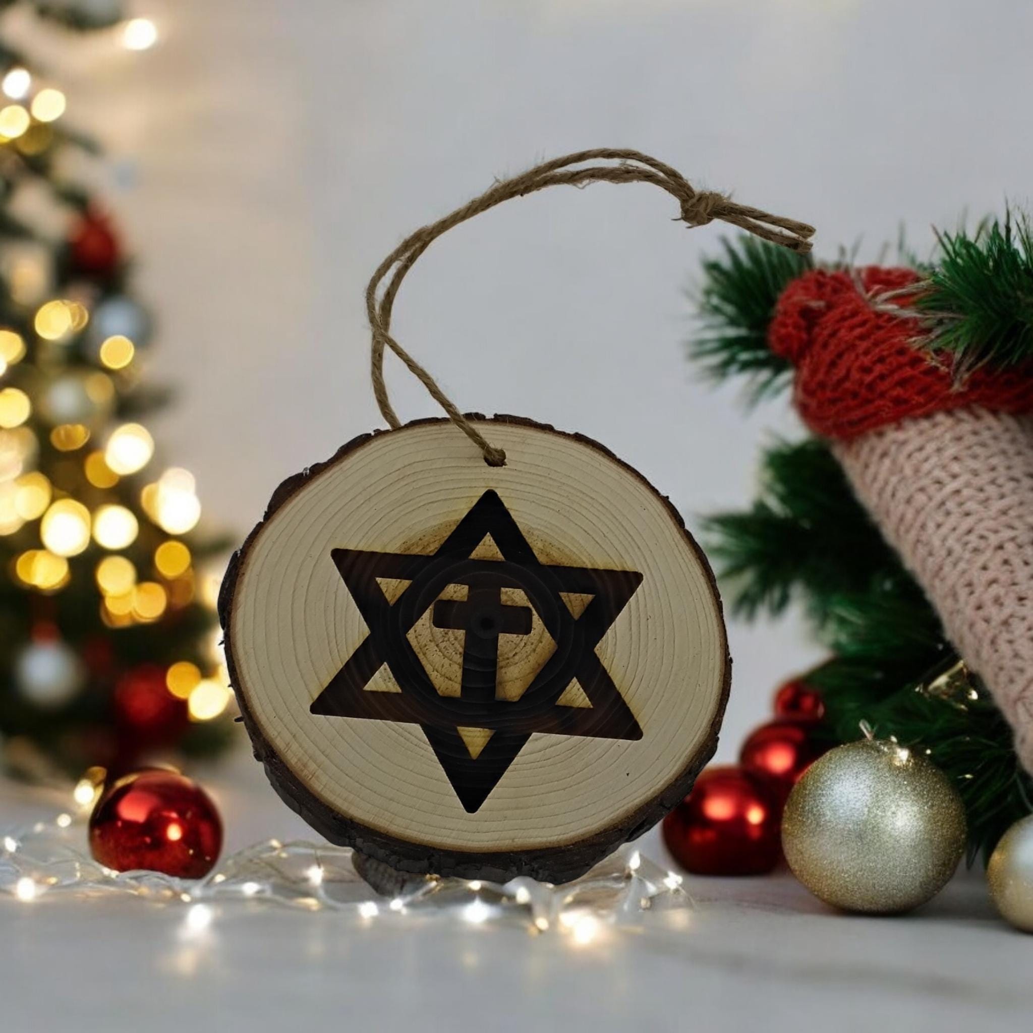 Star of David with the Cross handmade engraved on natural pine wood slice with the bark great decoration for the Christmas tree.