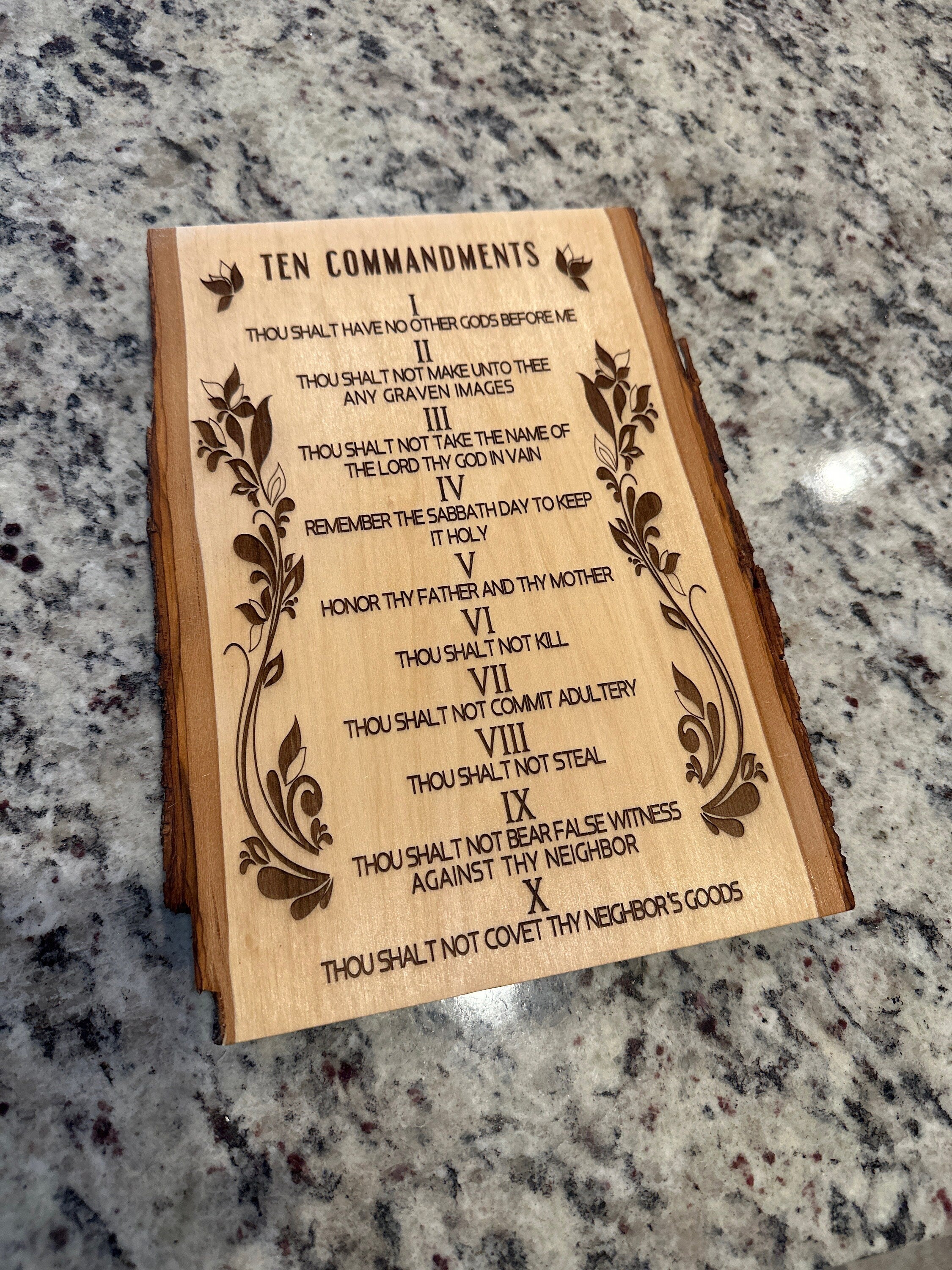 Ten Commandments Basswood live edge wall art hanging handmade wood engraved in English available in size 13” x 9” and 11” x 8”.