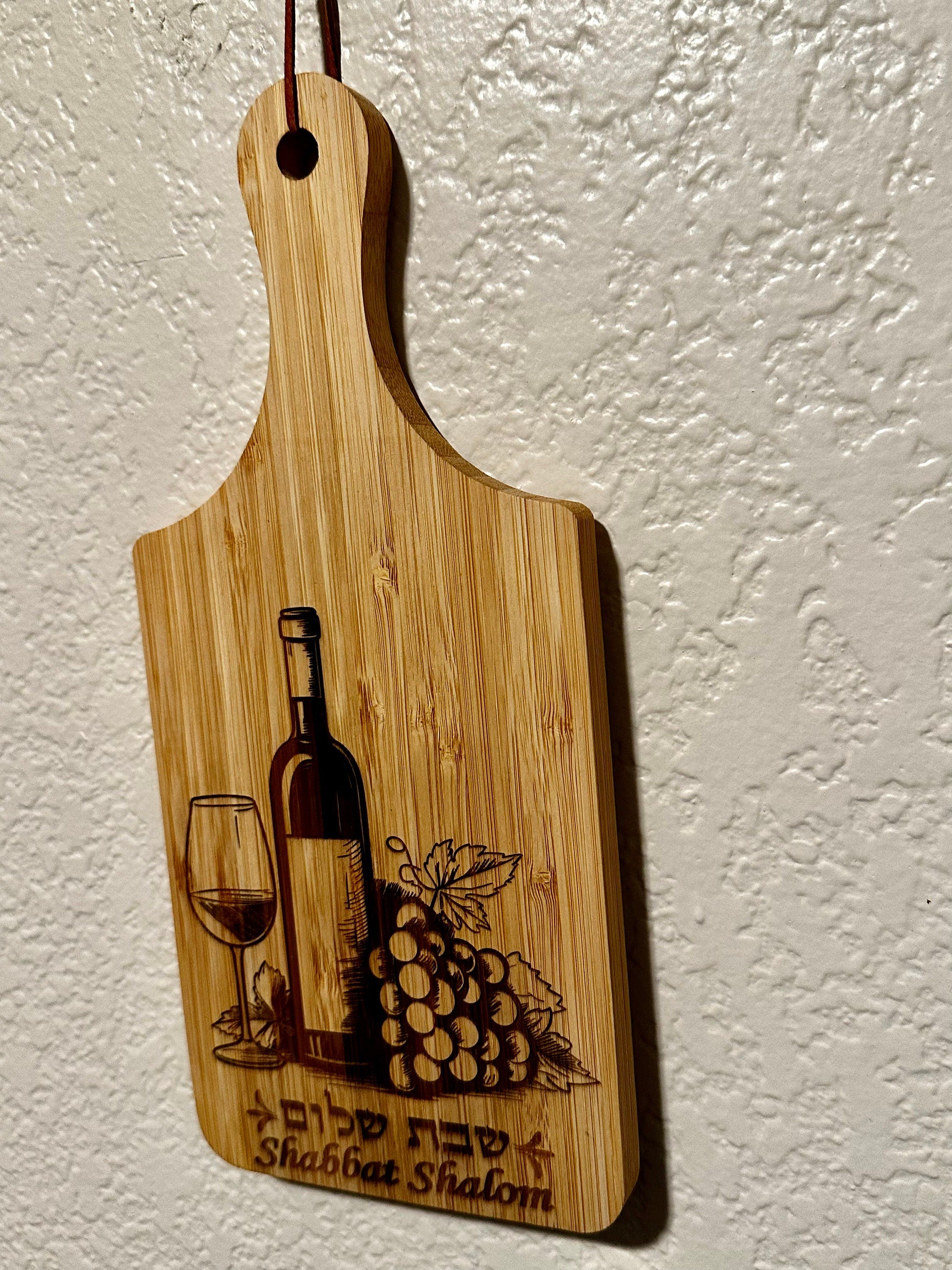 Shabbat shalom cutting board Bamboo wood with engraving of wine bottle glass with Hebrew and English Shabbat shalom or Hamsa cutting board