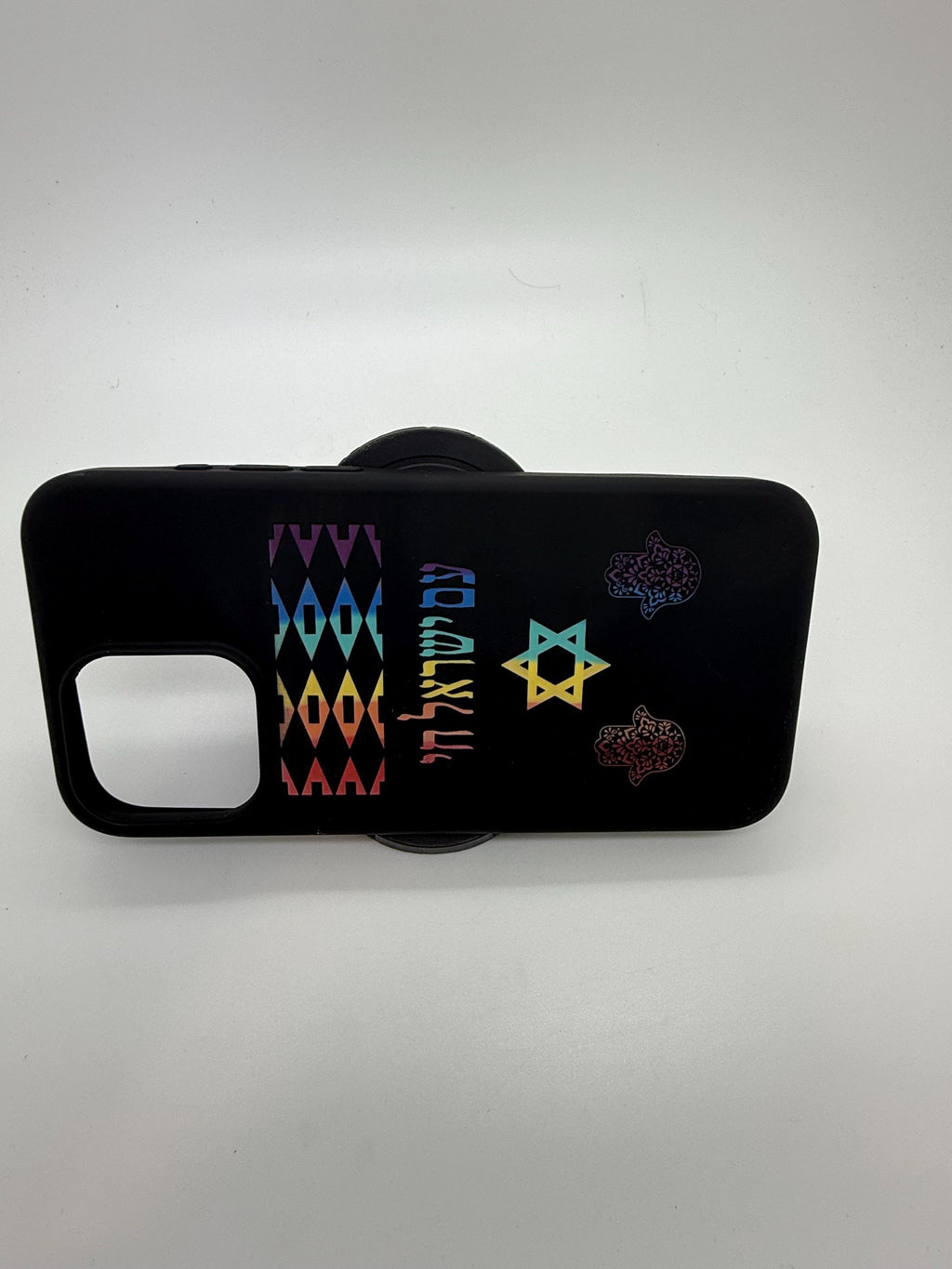 Am Israel Chai with the Star of David and Hamsa engraved in Hebrew phone case for iPhone 15 pro max with a stand
