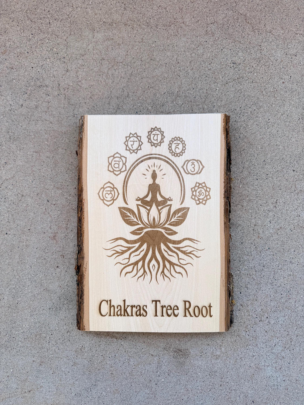Chakra Tree Root yoga sign engraved on live edge basswood size 11” x 8”