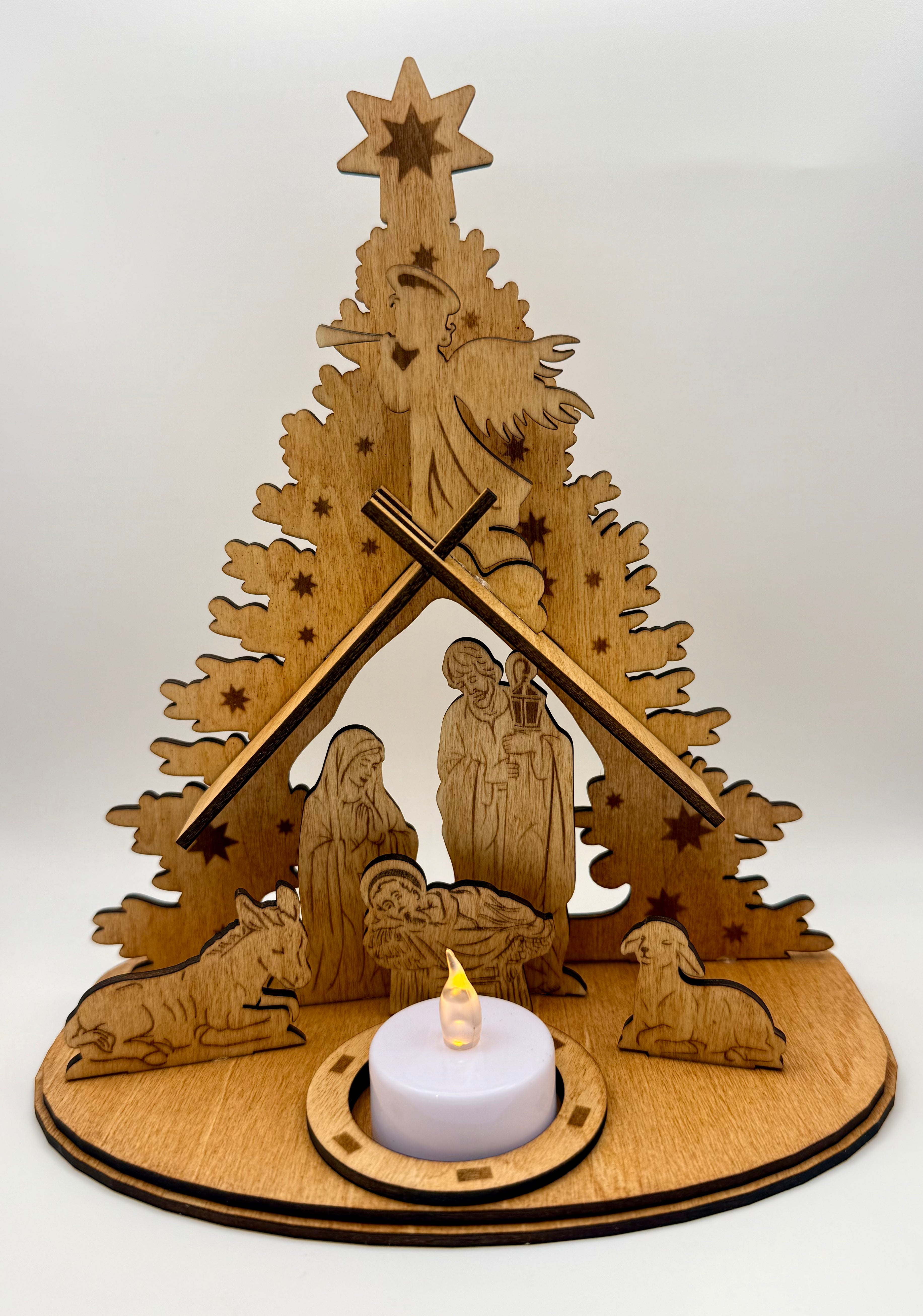 Nativity scene handmade from basswood and 3 olive wood ornaments from Bethlehem