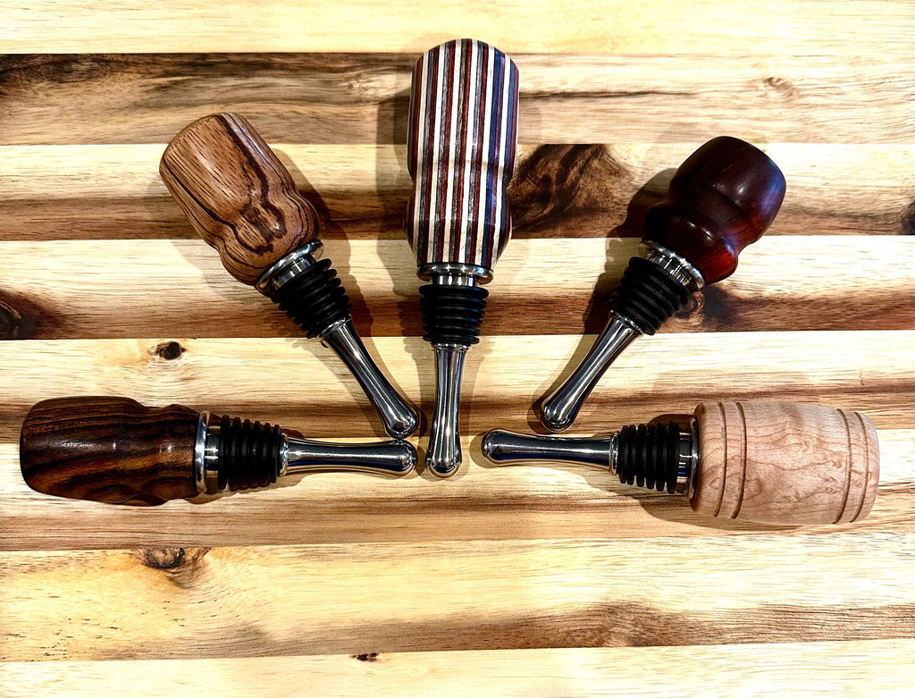 handmade wooden wine bottle stoppers hand turned from hard wood with stainless steel