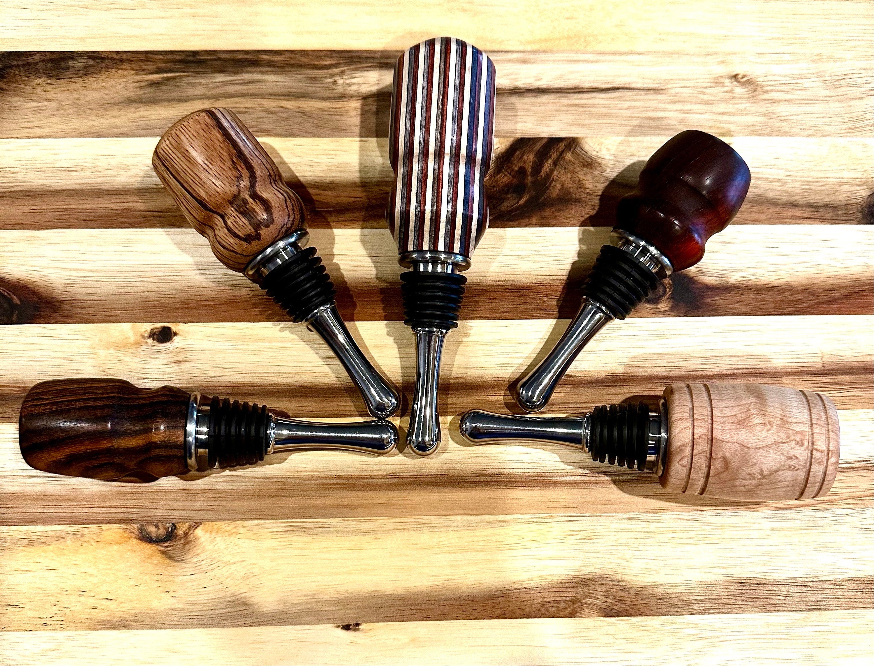 handmade wooden wine bottle stoppers hand turned from hard wood with stainless steel