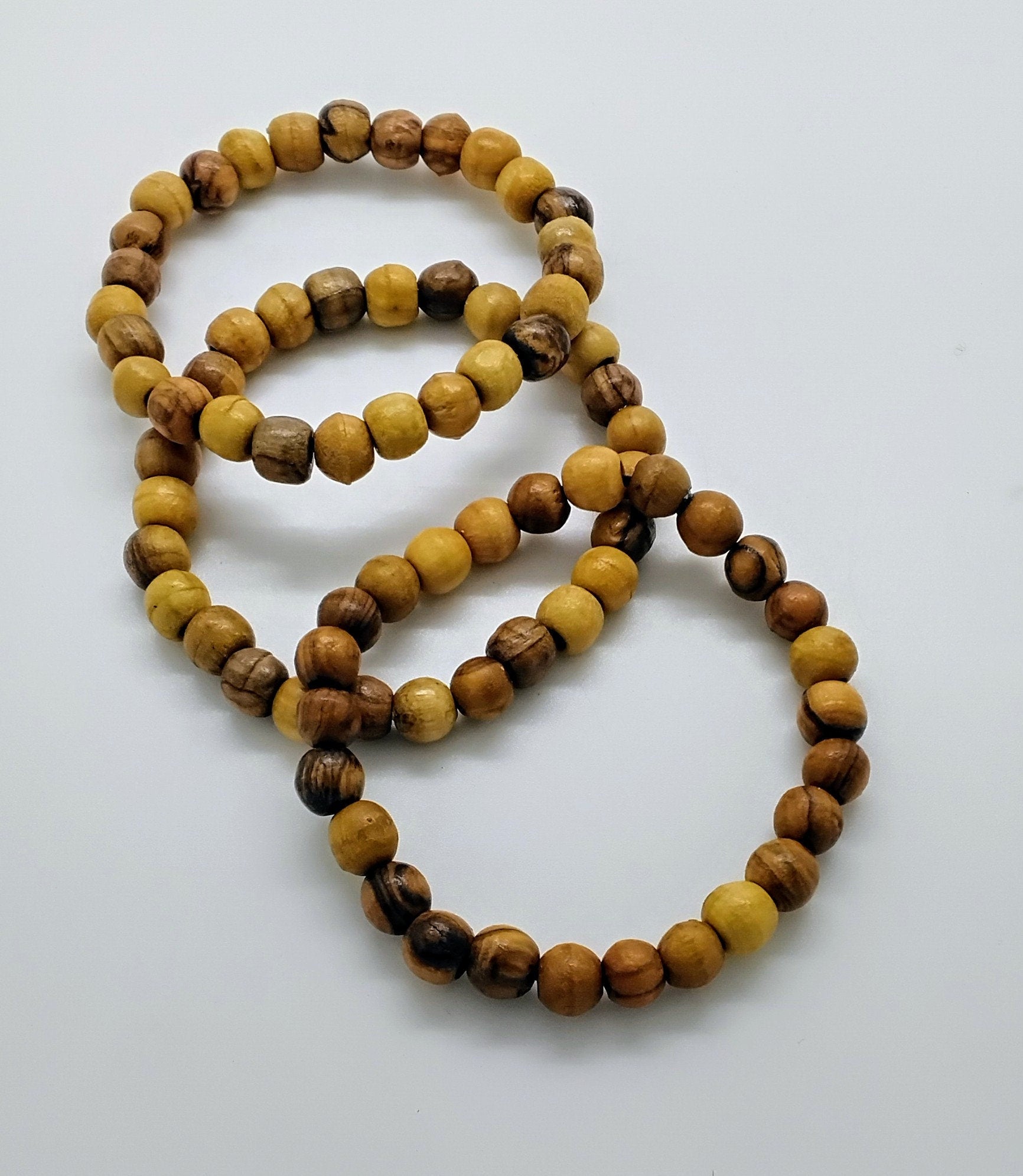 Handmade from Bethlehem olive wood beads stretch bracelet available in size 6" to 7.5"