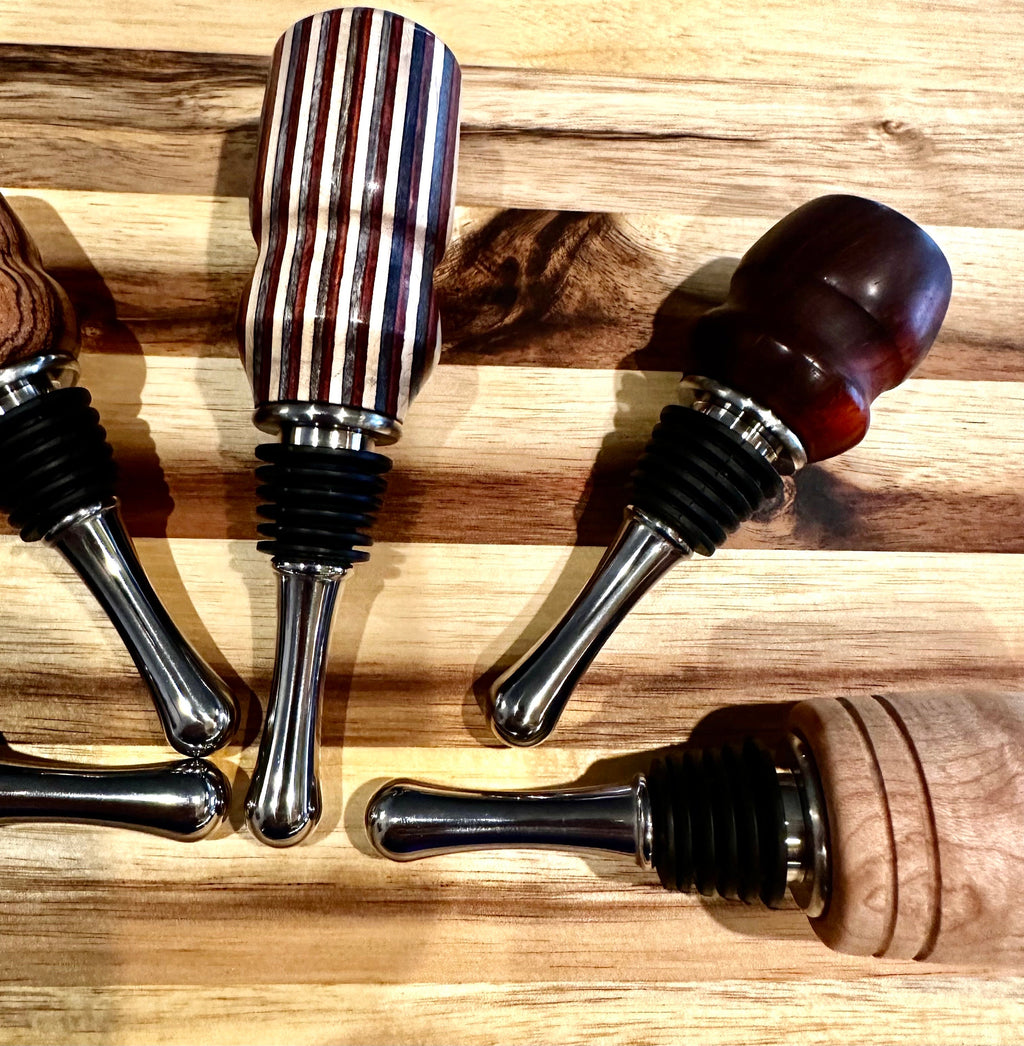 handmade wooden wine bottle stoppers hand turned from hard wood with stainless steel