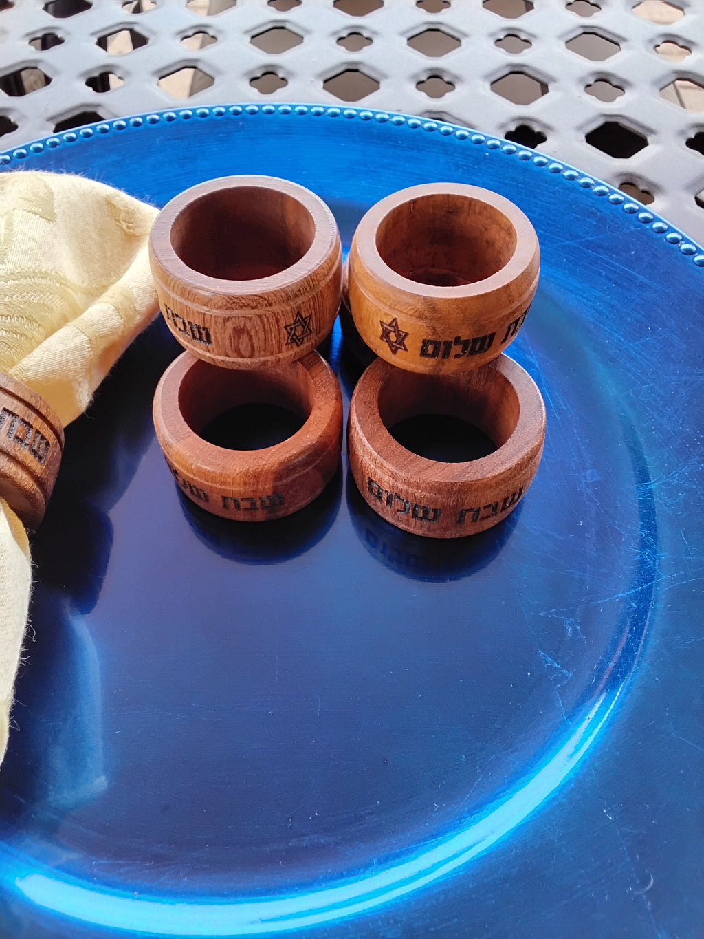 Wooden napkin rings set with Hebrew Shabbat Shalom dinner celebration with the star of David engraved on the wood rings, set of 4 rings.