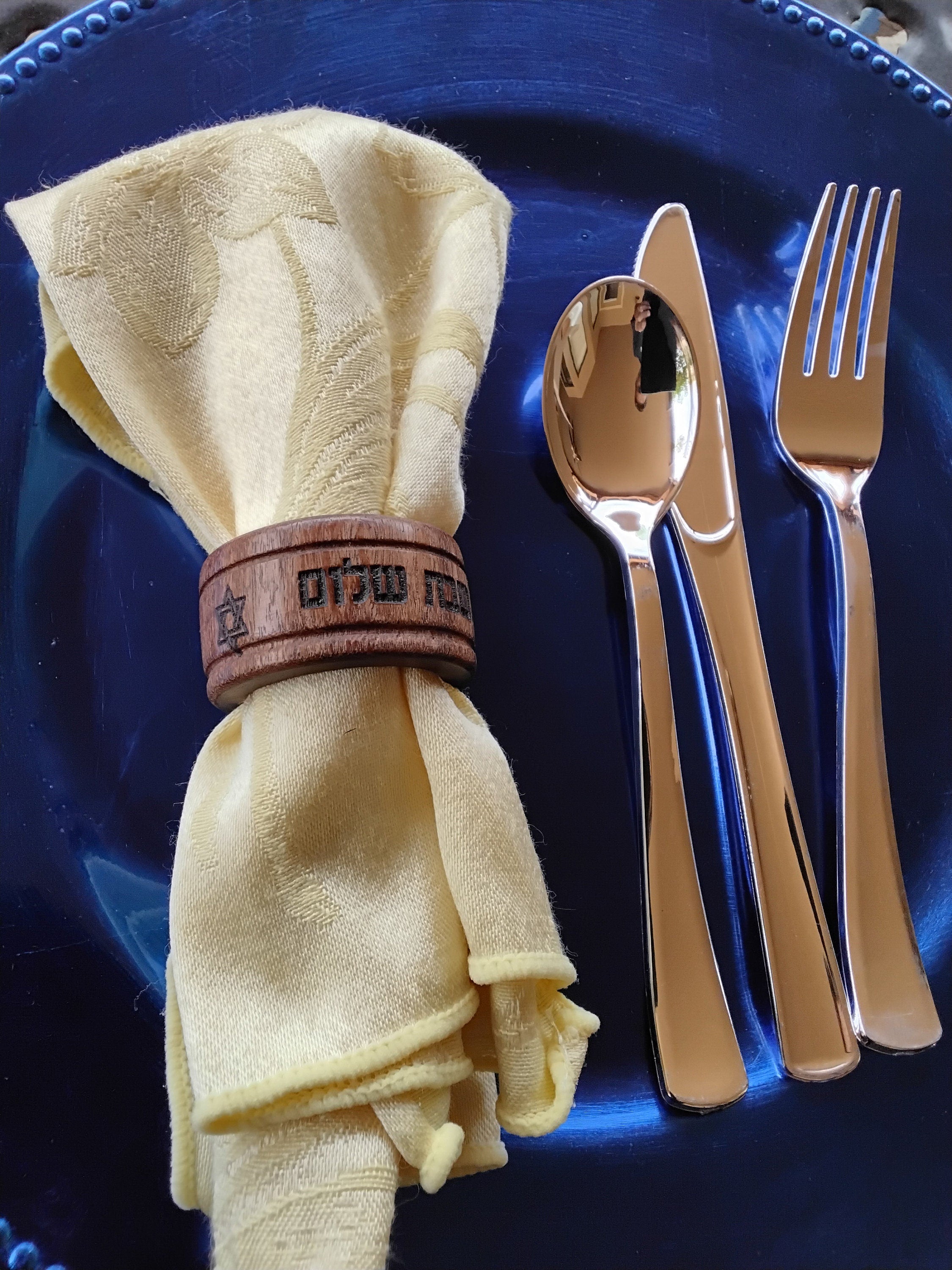 Wooden napkin rings set with Hebrew Shabbat Shalom dinner celebration with the star of David engraved on the wood rings, set of 4 rings.